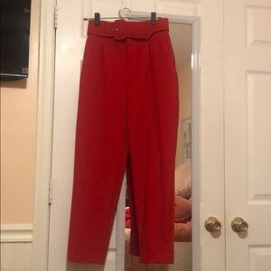 Red high waisted trousers with belt